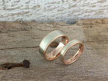 Load image into Gallery viewer, A matching pair of 9ct two tone white and rose gold edge comfort fit wedding bands. Red and white gold his and hers weddign bands. engrave.