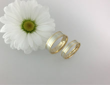 Load image into Gallery viewer, 9ct two tone white and yellow gold edge flat wedding bands. Totally handmade. Yellow and white gold his and hers weddign bands. engraved.