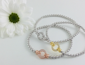 Exquisite Silver Designer Circle Bracelet.  Rose gold pave set circle.