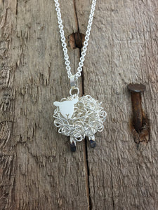 Handmade silver sheep necklace, individually crafted in Wales at Jeffs Jewellers.