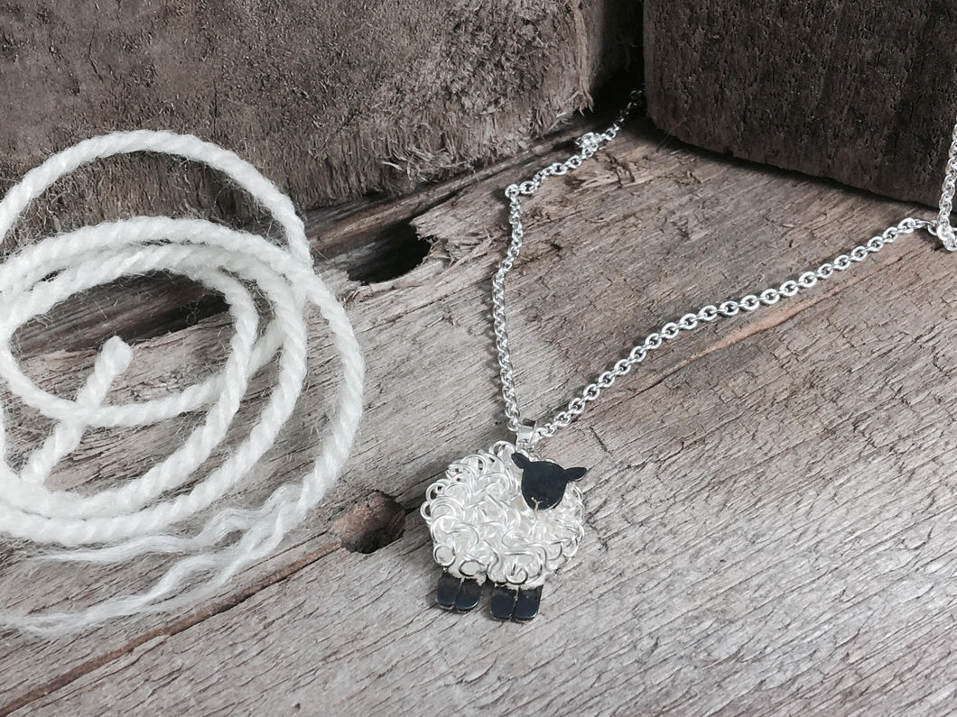 Handmade silver sheep necklace, individually crafted in Wales at Jeffs Jewellers.
