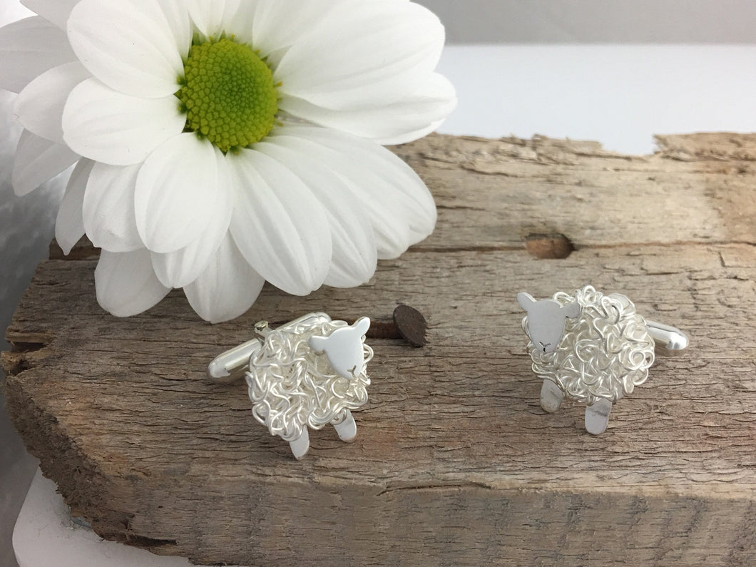 Handmade silver sheep cufflinks, individually crafted in Wales at Jeffs Jewellers.