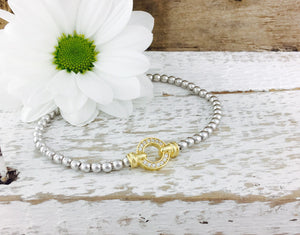 Exquisite Silver Designer Circle Bracelet. Yellow gold pave set circle