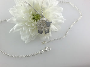 Silver sheep necklace, individually hand crafted in Wales at Jeffs Jewellers.